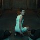 Eleven, in a white body suit, kneels next to the bodies of two dead guards and looks back over her shoulder.
